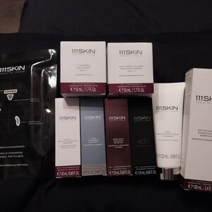 111SKIN Skincare Collection with Black and White Packaging
